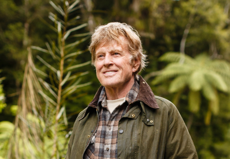 Robert Redford is Mr. Meacham, an old wood carver who delights local children with tales of the fierce dragon that resides deep in the woods nearby in Disney's PETE'S DRAGON.