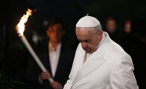 Pope Francis presides at Way of the Cross outside Colosseum in Rome